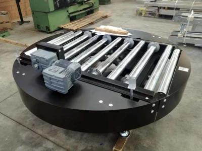 Rotating platforms for pallet diversion